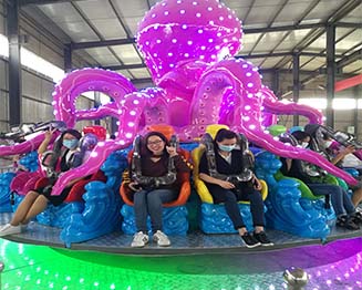 Amusement park rotating octopus ride